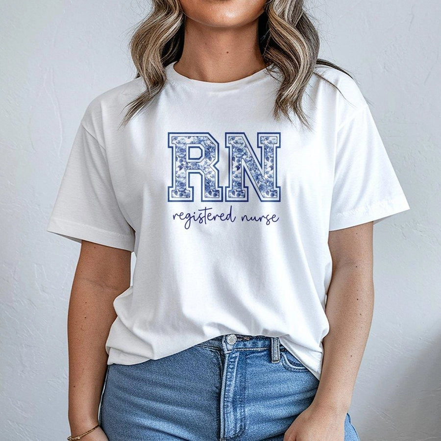 RN Registered Nurse T-Shirt | Blue Toile Floral Lettering Design | Premium Cotton Apparel | Gift for Nursing Student Graduation or Nurse Appreciation
