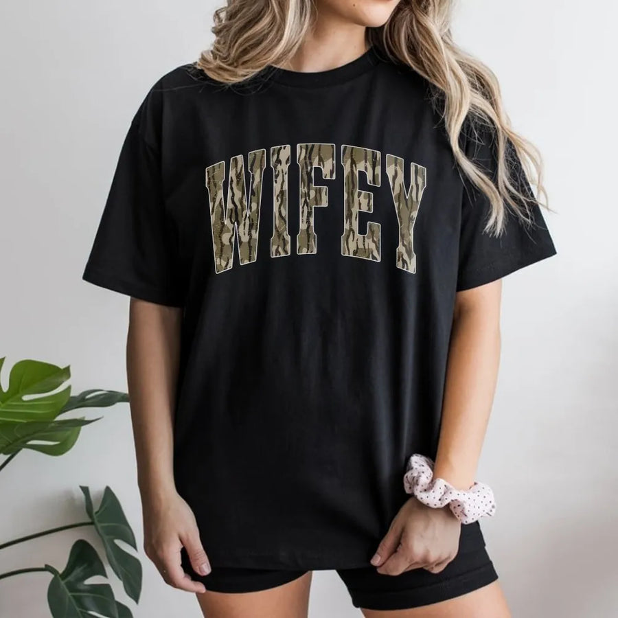 Wifey Camo T-Shirt | Distressed Varsity Lettering | Soft 100% Cotton Premium Tee | Cute Matching Wedding Gift for Bride or Hunting Wife