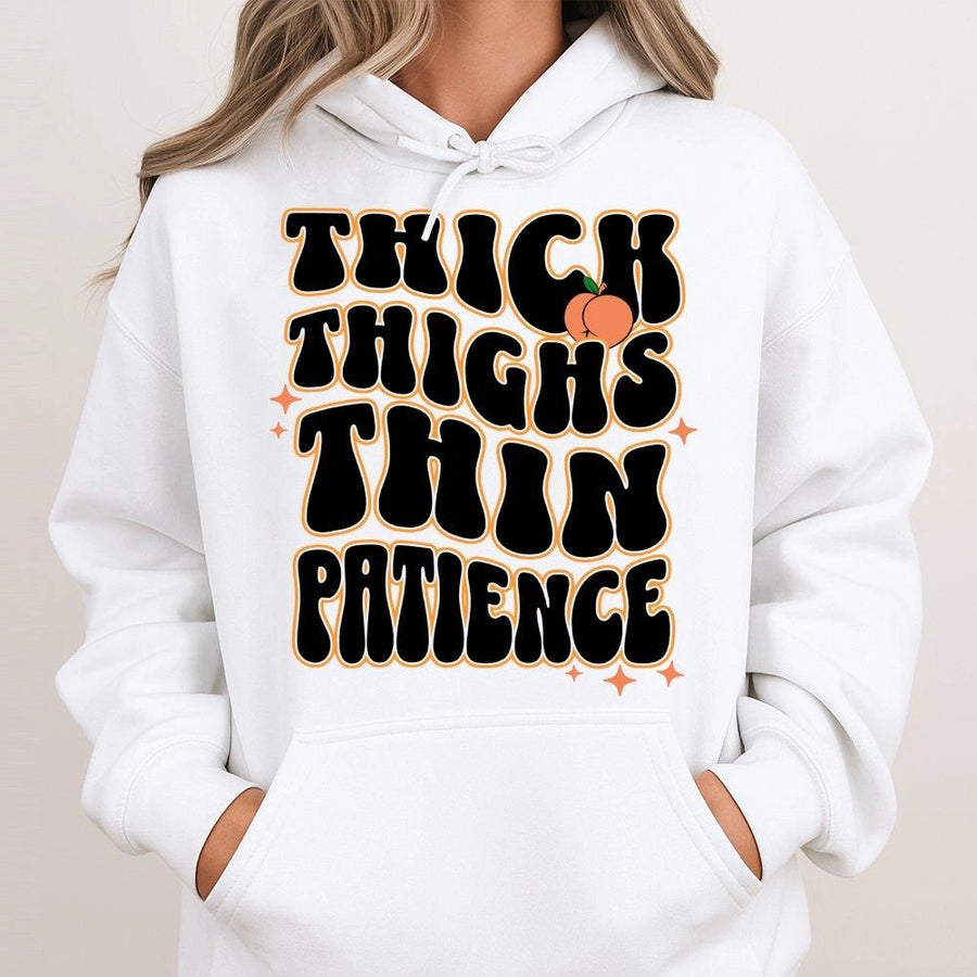 Thick Thighs Thin Patience Hoodie | Retro Groovy Typography Graphic | Premium Cotton Blend | Funny Gym Gift for Women and Fitness Enthusiasts
