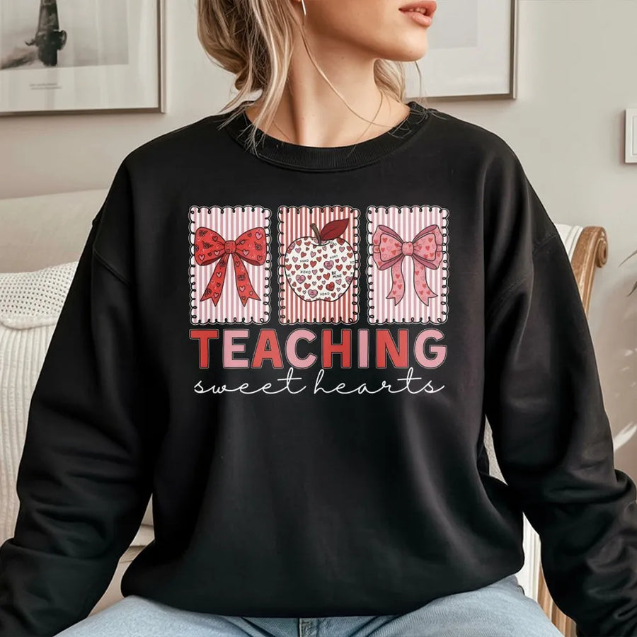 Teaching Sweet Hearts Sweatshirt | Valentine Teacher Apple Bow Graphic | Premium Cozy Fleece Pullover | Teacher Appreciation Valentine's Day Gift