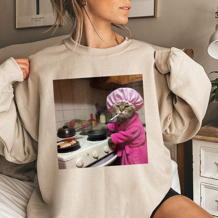 Funny Cat Cooking Sweatshirt | Sassy Smoking Cat in Pink Robe Graphic | Premium Cotton Blend Crewneck | Humorous Gift for Cat Lovers & Meme Fans