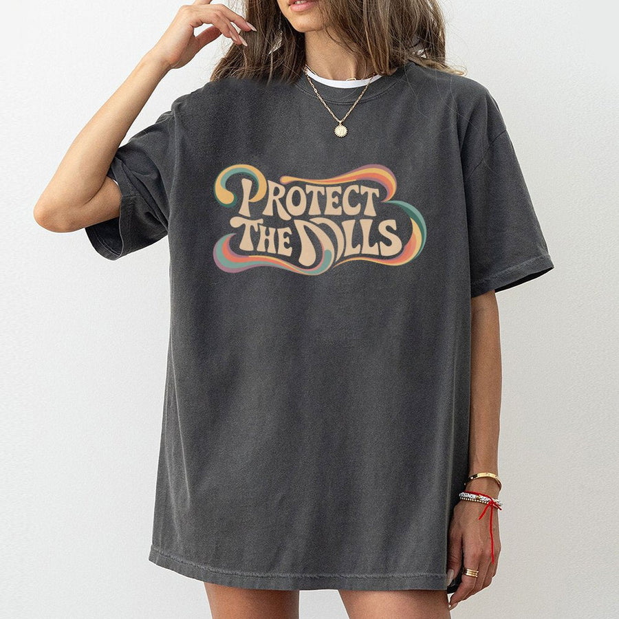 Protect The Dolls T-Shirt | Retro 70s Groovy Graphic Typography | Premium 100% Cotton | Feminist Empowerment Gift For Women