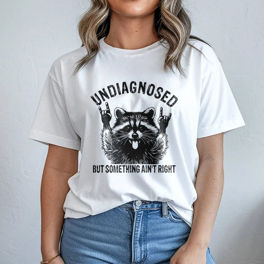 Undiagnosed But Something Ain't Right Raccoon T-Shirt | Funny Retro Meme Graphic | Premium Soft Cotton Tee | Sarcastic Humor Gift For Men & Women