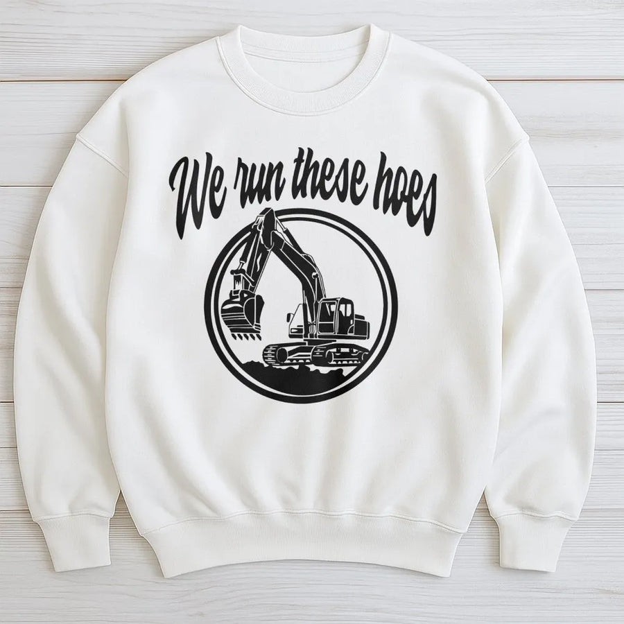 We Run These Hoes Excavator Sweatshirt | Funny Construction Worker Crewneck | Soft Cotton Blend Graphic Apparel | Gift For Heavy Equipment Operator