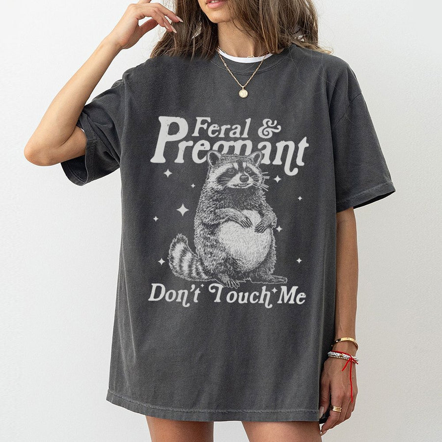 Feral and Pregnant Raccoon T-Shirt | Funny Maternity Graphic Tee | Premium 100% Cotton | Humorous Gift for First Time Moms and Expecting Women