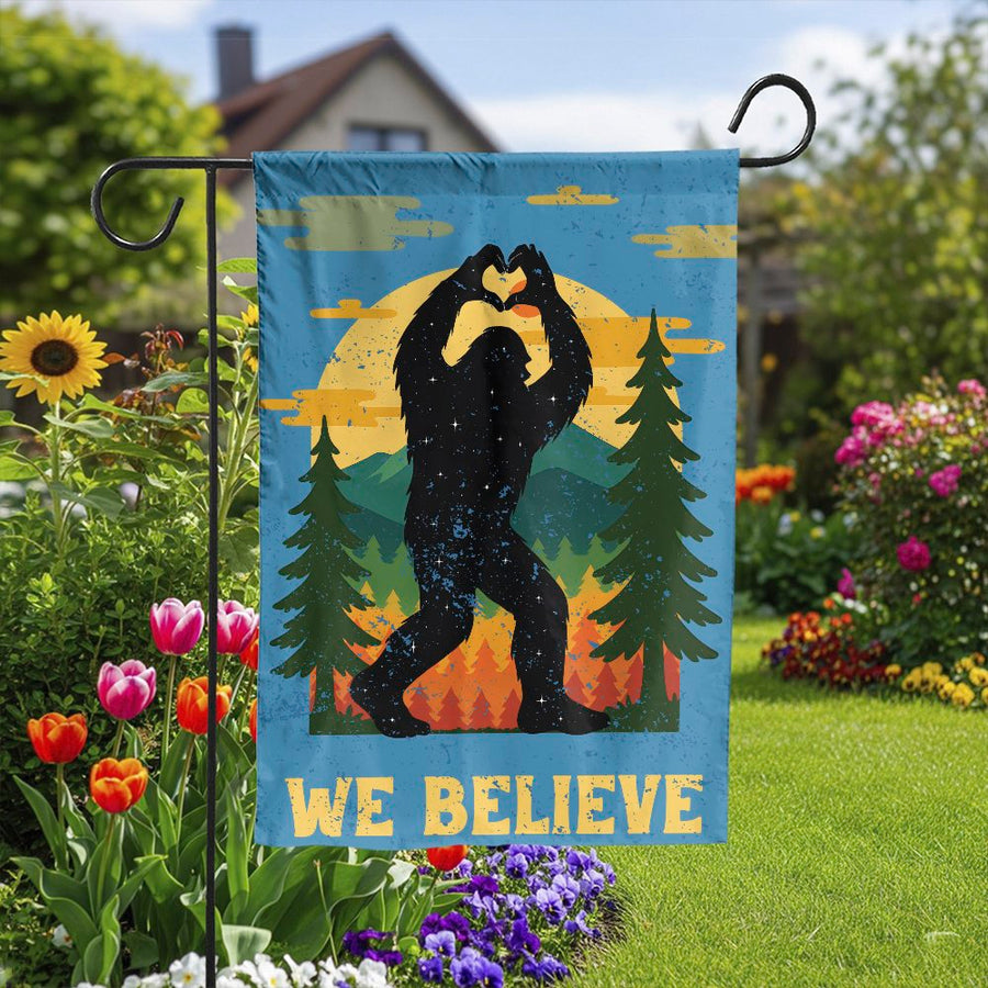 Bigfoot Garden Flag | Retro We Believe Heart Hands Design | Double-Sided Weather Resistant Fabric | Funny Outdoor Yard Decor Gift