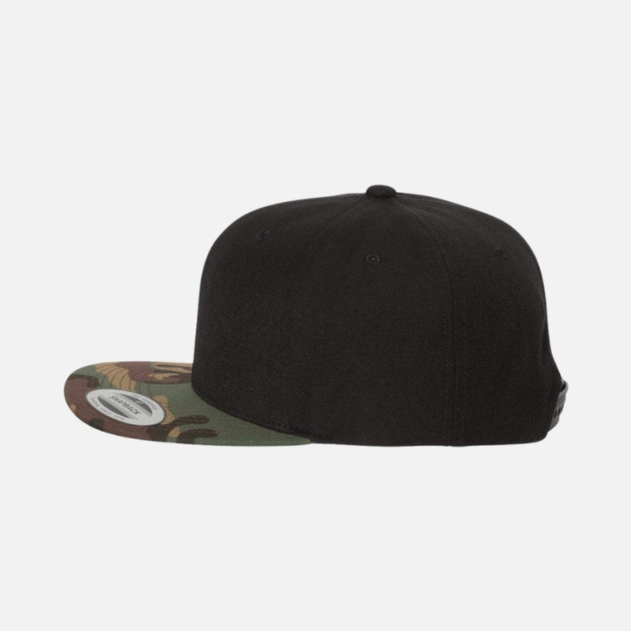 Side profile of the cap: tall structured crown and a completely flat, horizontal bill, with the maker&rsquo;s sticker still on it